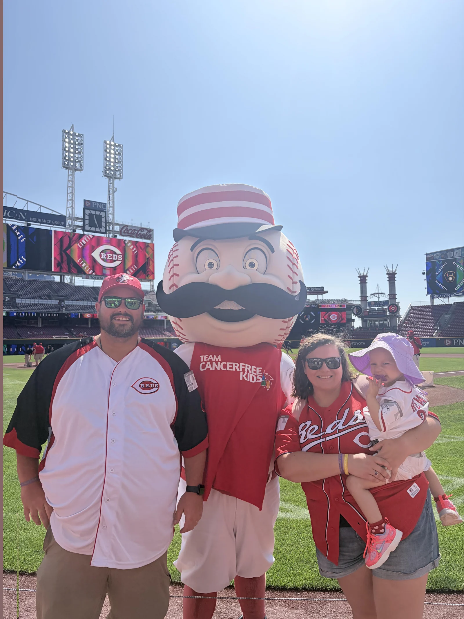 Remington and her family with Mr. Redlegs at Great American Ball Park