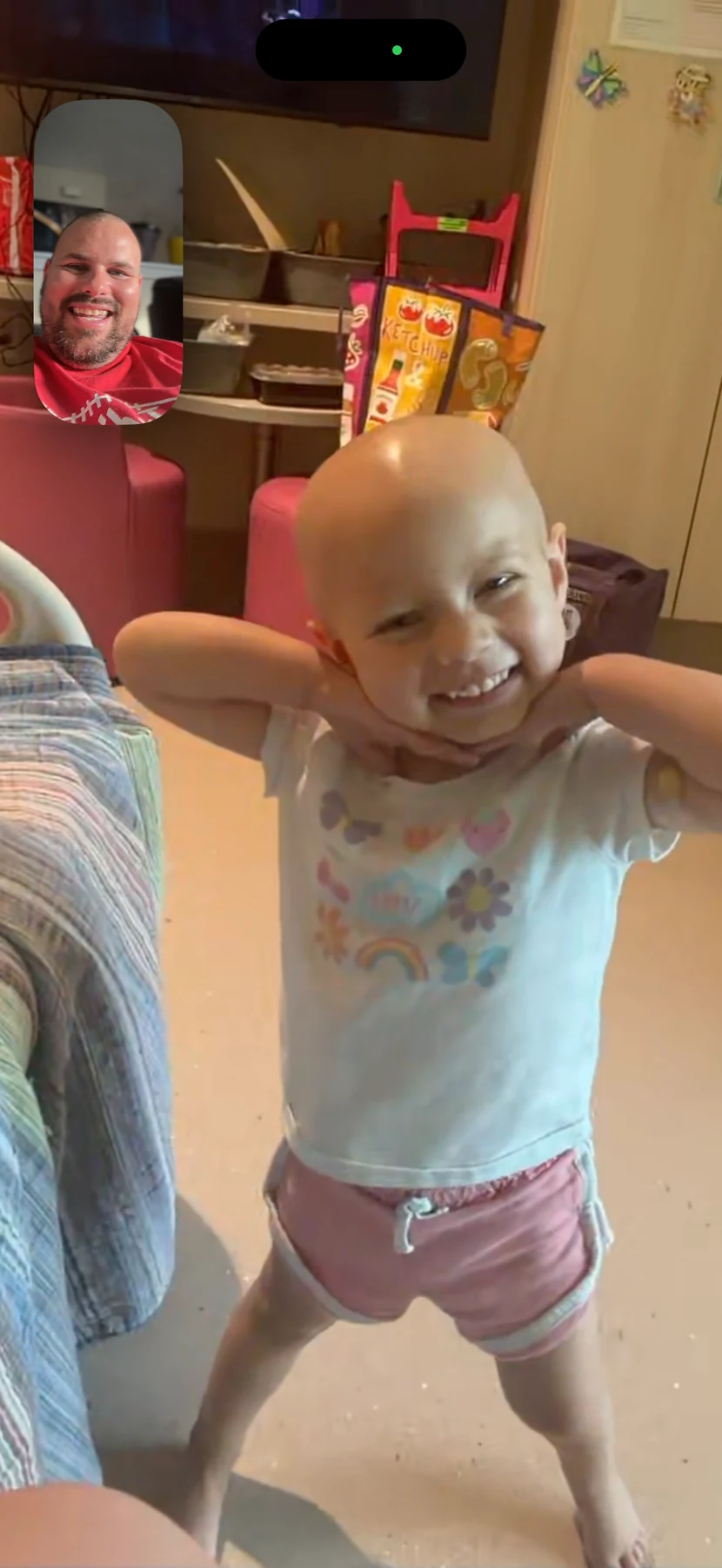 Remington smiling during a video call